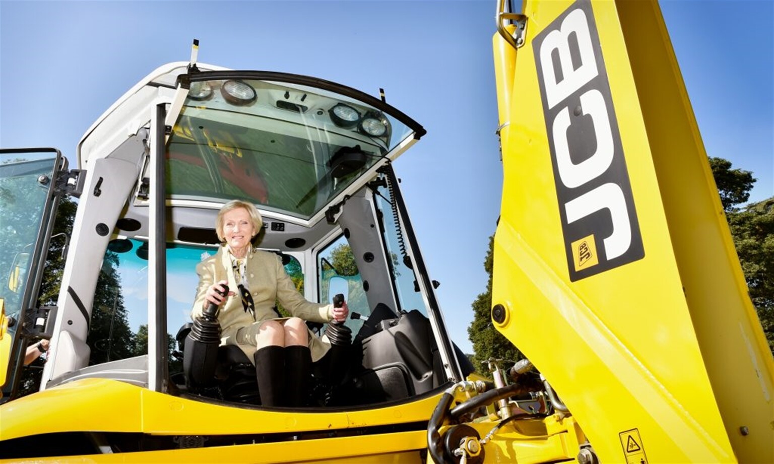 JCB Backhoe controls are a piece of cake for Mary Berry
