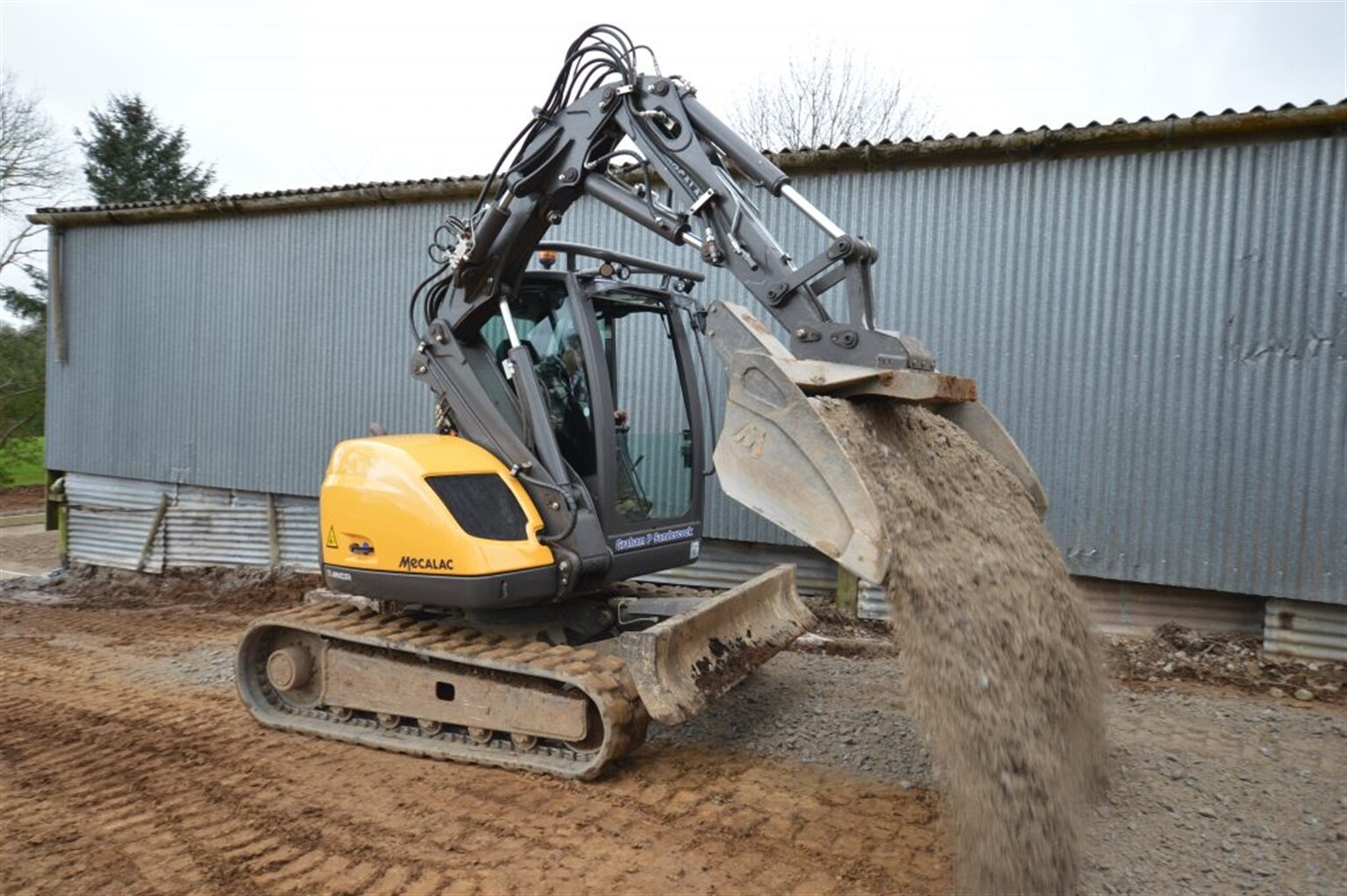 Is it a skid-steer or an excavator, no its a Mecalac