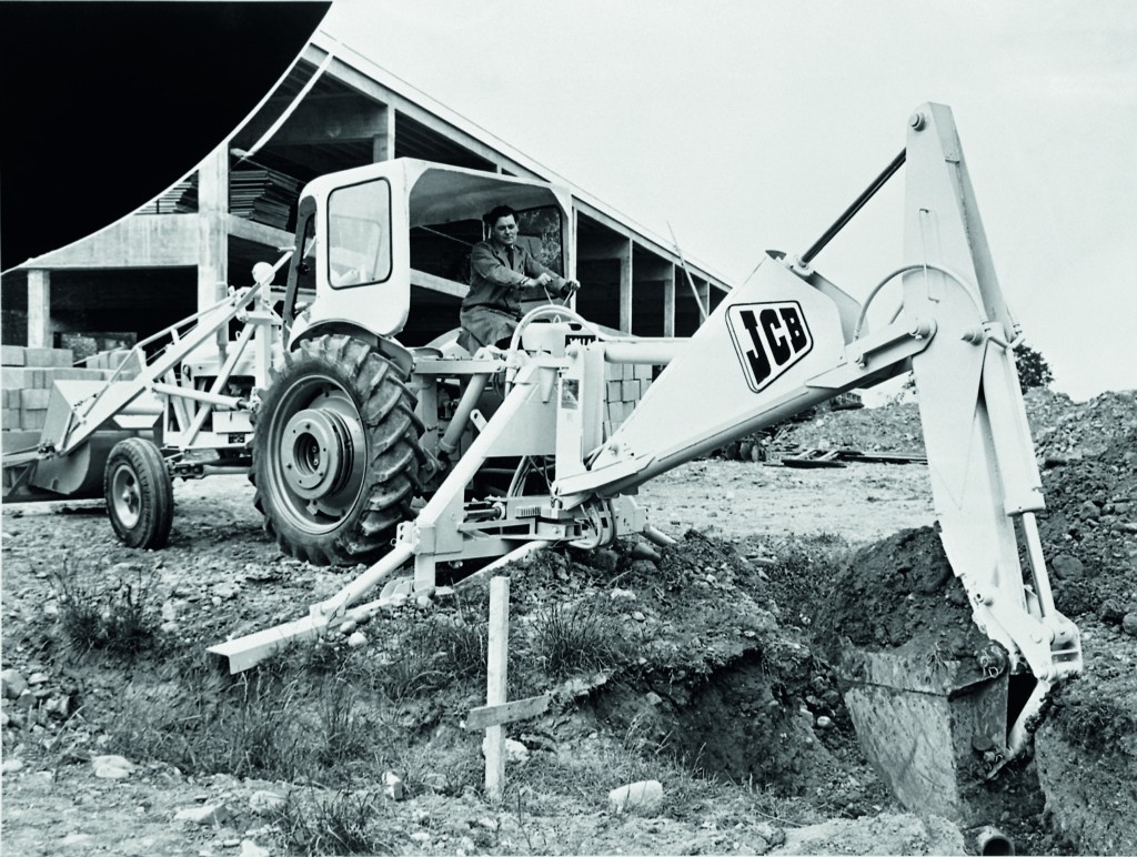 1957 - the JCB Hydra-Digga was advertised as being able to dig through rock