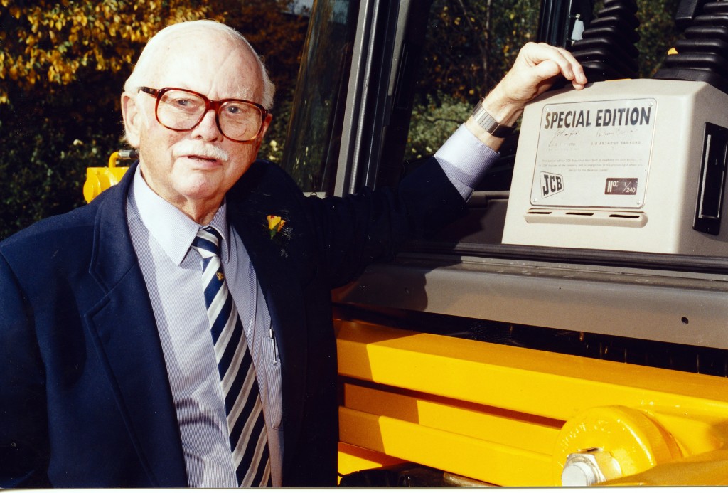 Mr JCB pictured in 1996 with a special edition JCB backhoe loader to mark his 80th birthday
