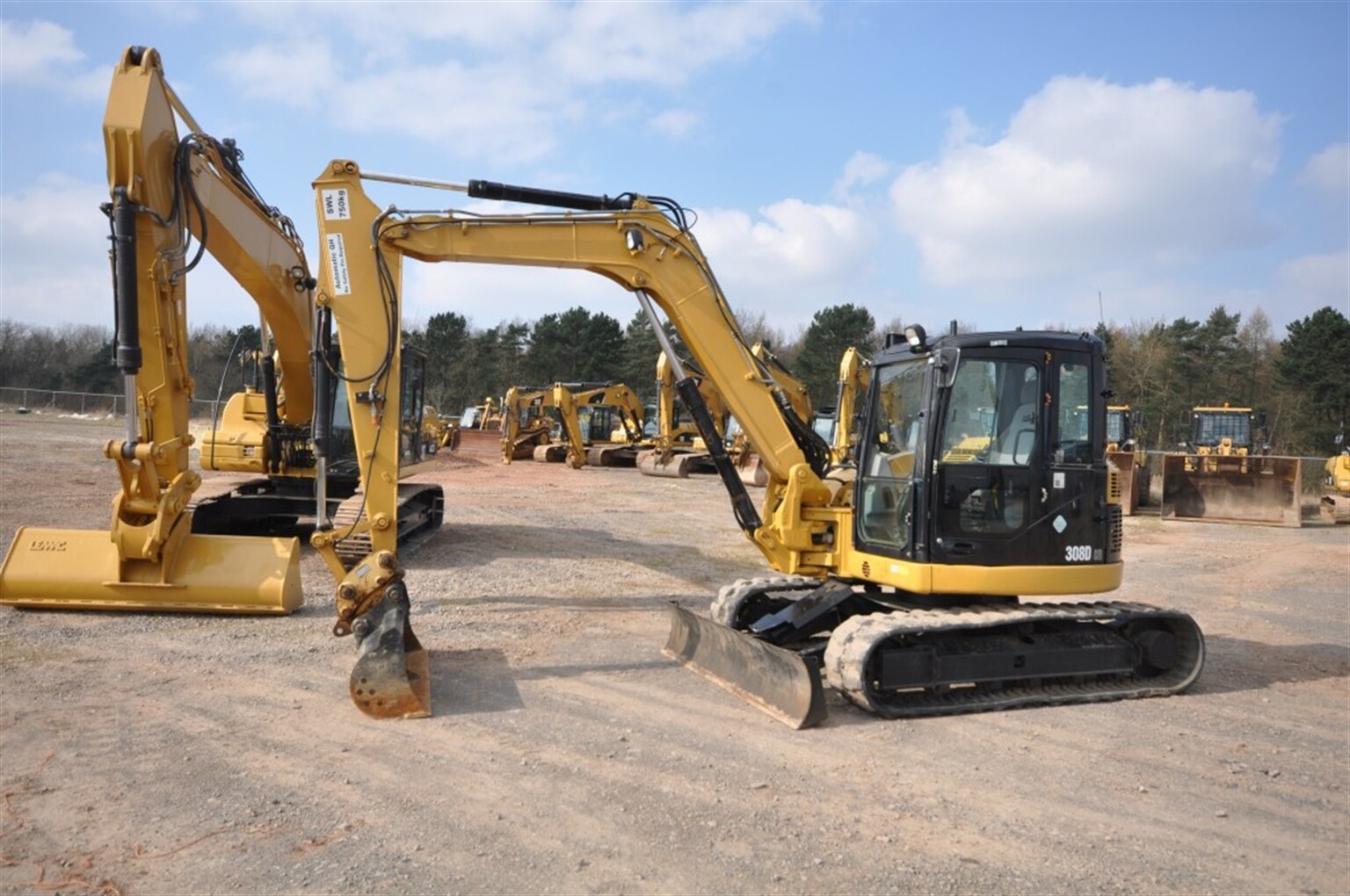 Digger checks out the kit at the auction build up