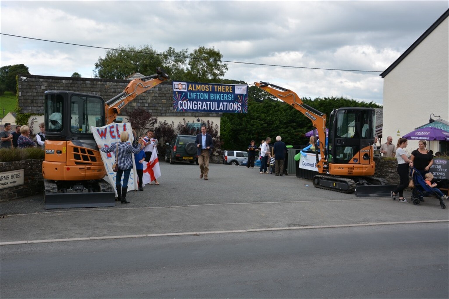 Case diggers form guard of honour for the Lifton Bikers