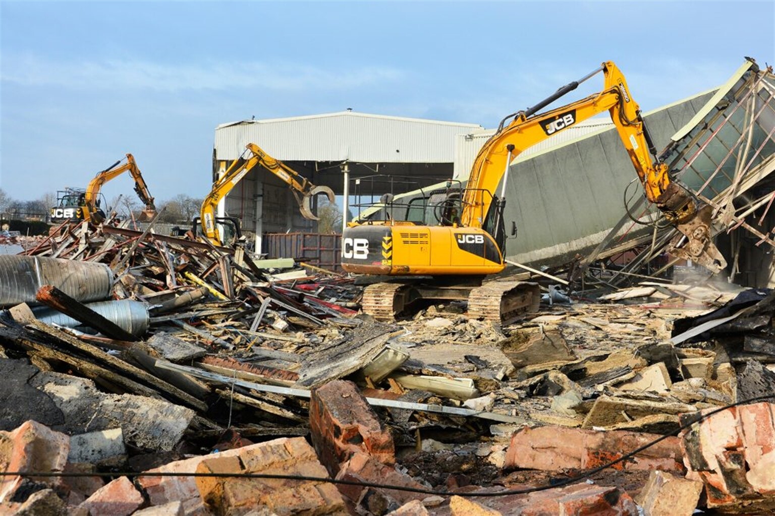 JCB kit takes down the old home