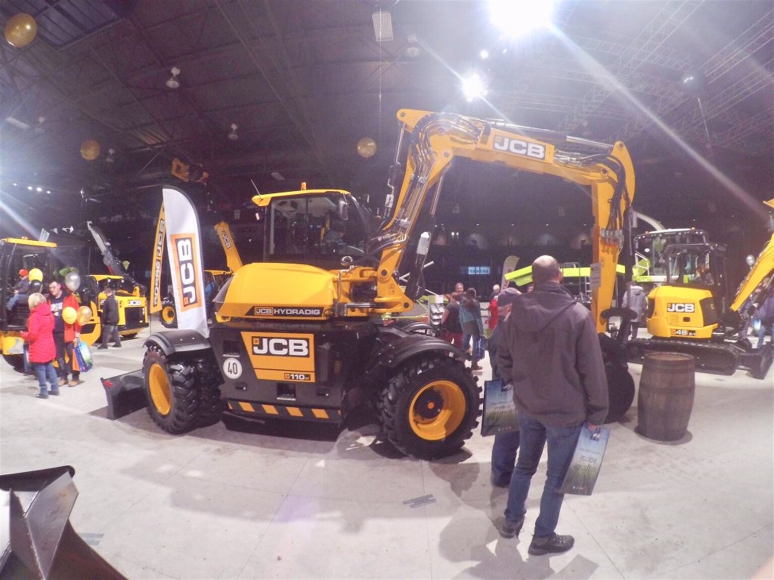 Canadian plant man gets into JCB at SIMAQ 2018 in Quebec