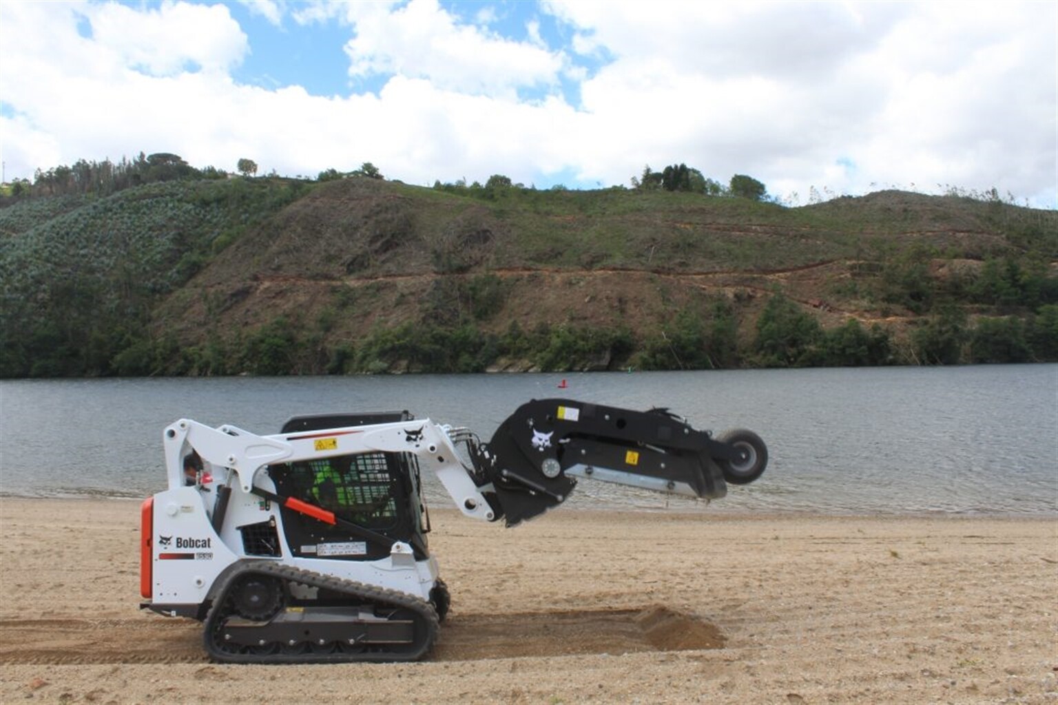 Bobcat Attachment Cleans up on Portuguese Beach