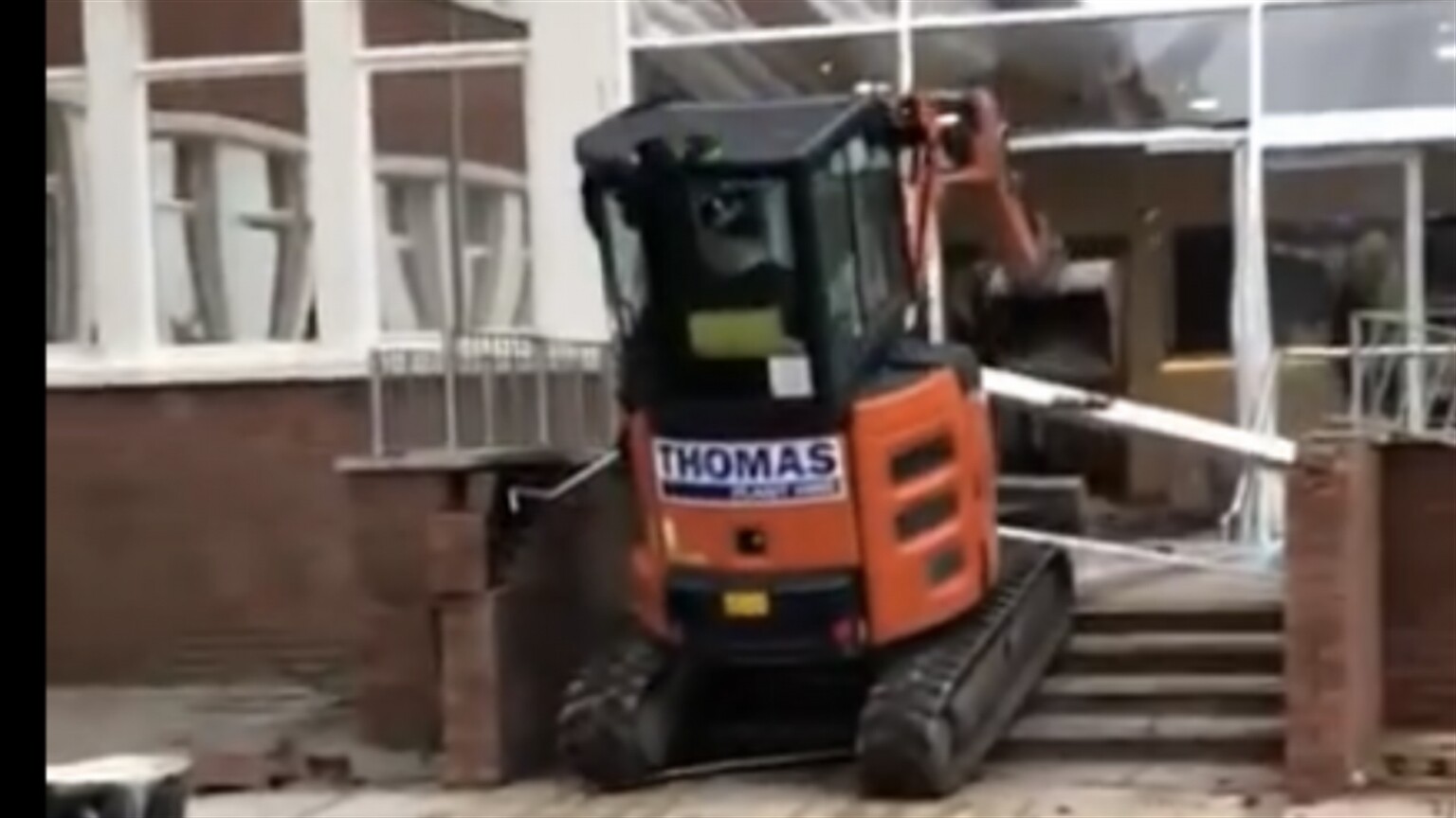 Man goes crazy in a digger