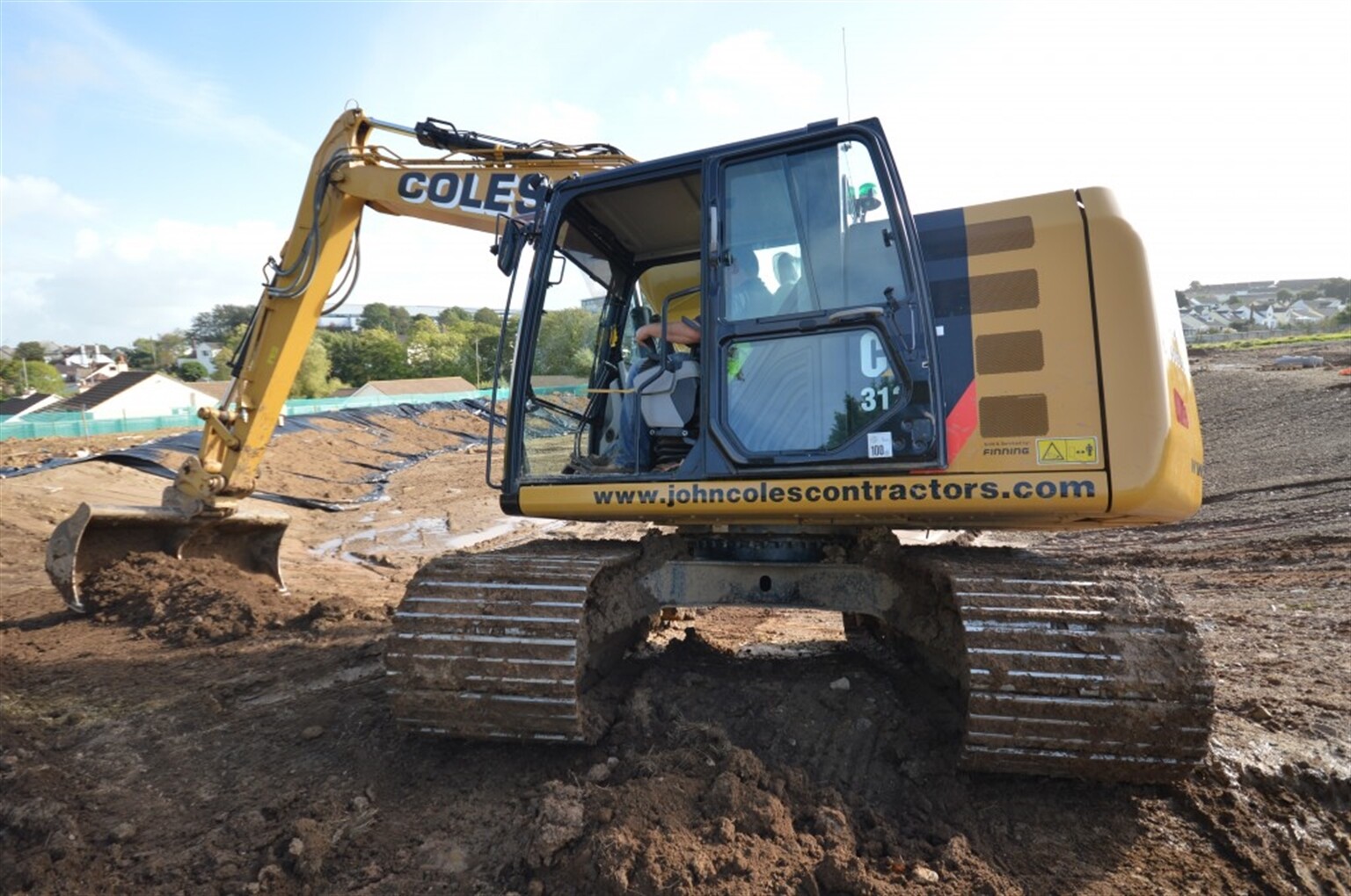 Cat E series excavator tackles water problem