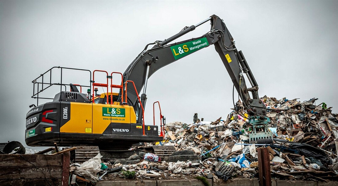 Volvo diggers operating at recycling centre