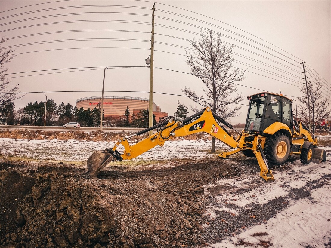 Taylor White puts his Girl in the Backhoe