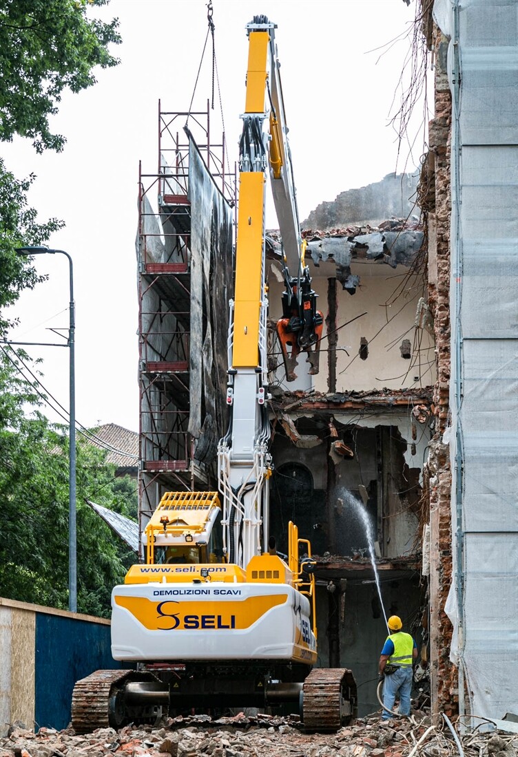 Demolition excavator at work in Milan