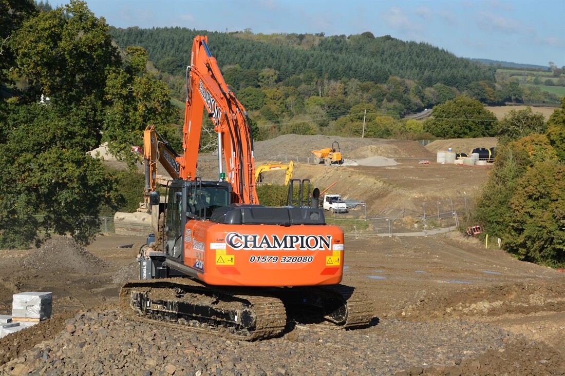Champion Hitachis out in the Field
