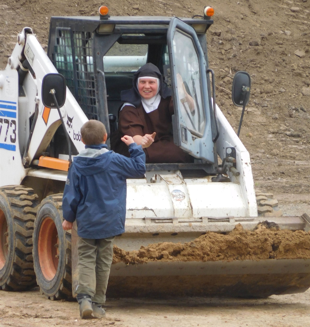 Nuns learn to operate Bobcat loader