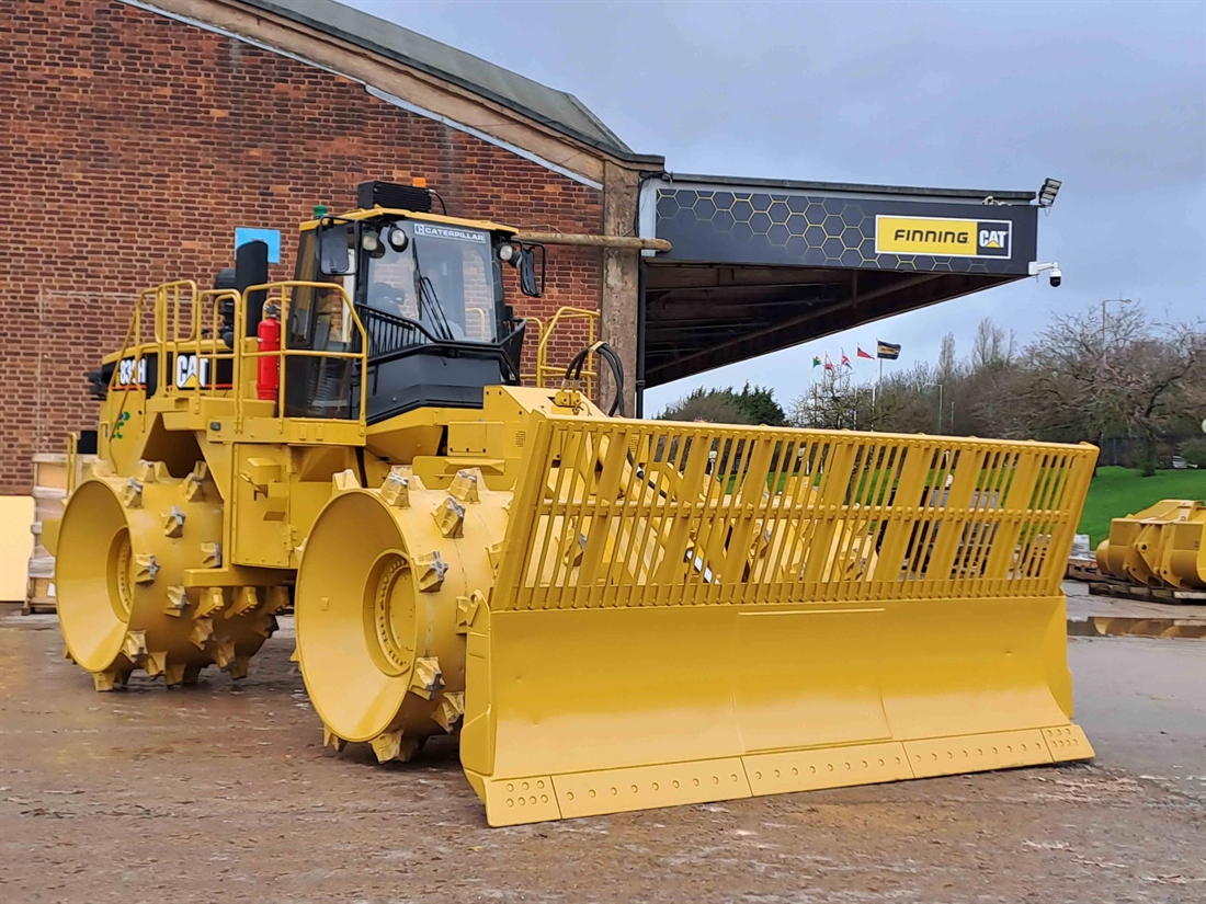 Restored Cat 836 landfill compactor