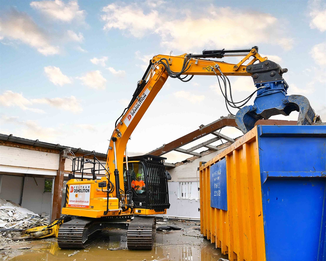 JCB X Series rips down theatre on demolition job