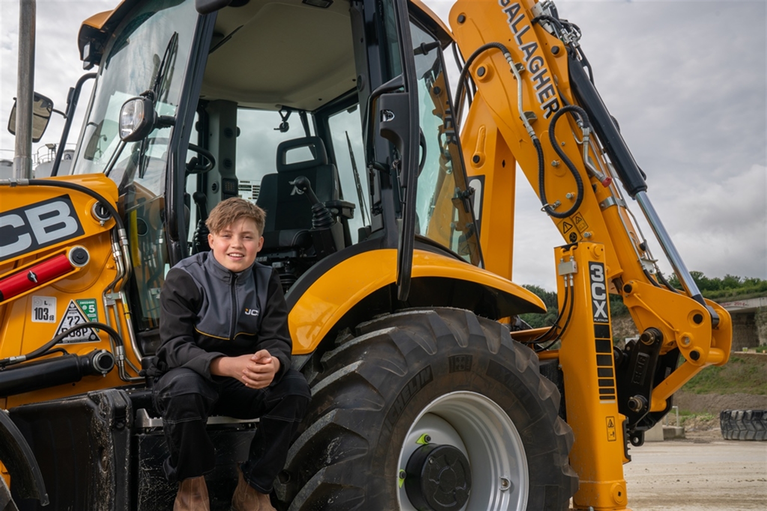 Hes Finlay, hes 13, and he drives around in a JCB