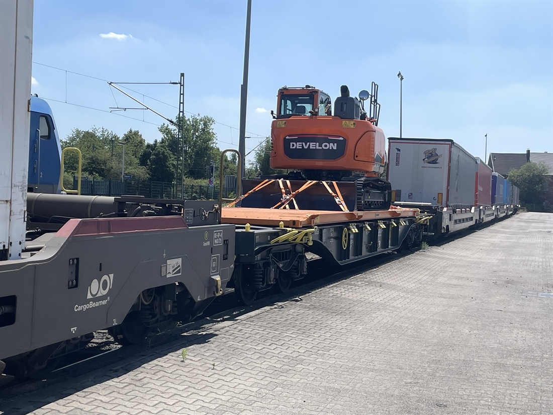 New Develon DX140LCR-7 crawler excavator used to prove new greener transport by rail for Europe