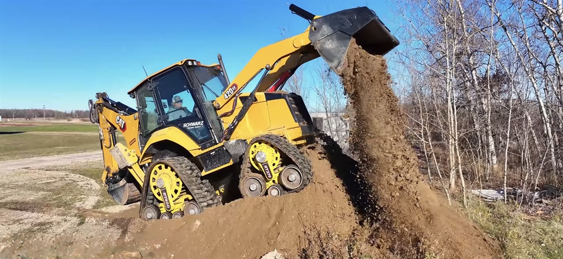 Wheeled Backhoe Loader Transforms into a Crawler Backhoe