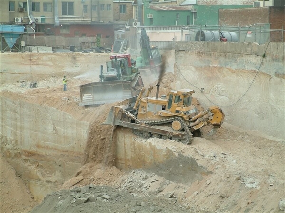 Big dozers rip it up in downtown Sydney